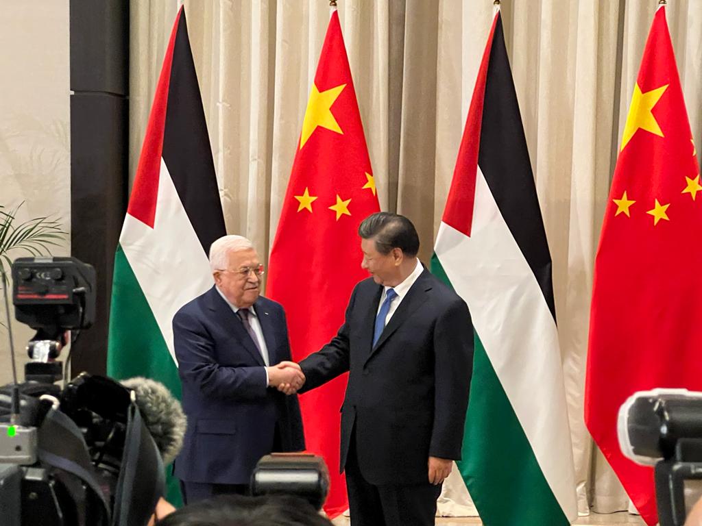 الرئيس عباس ونظيره الصيني